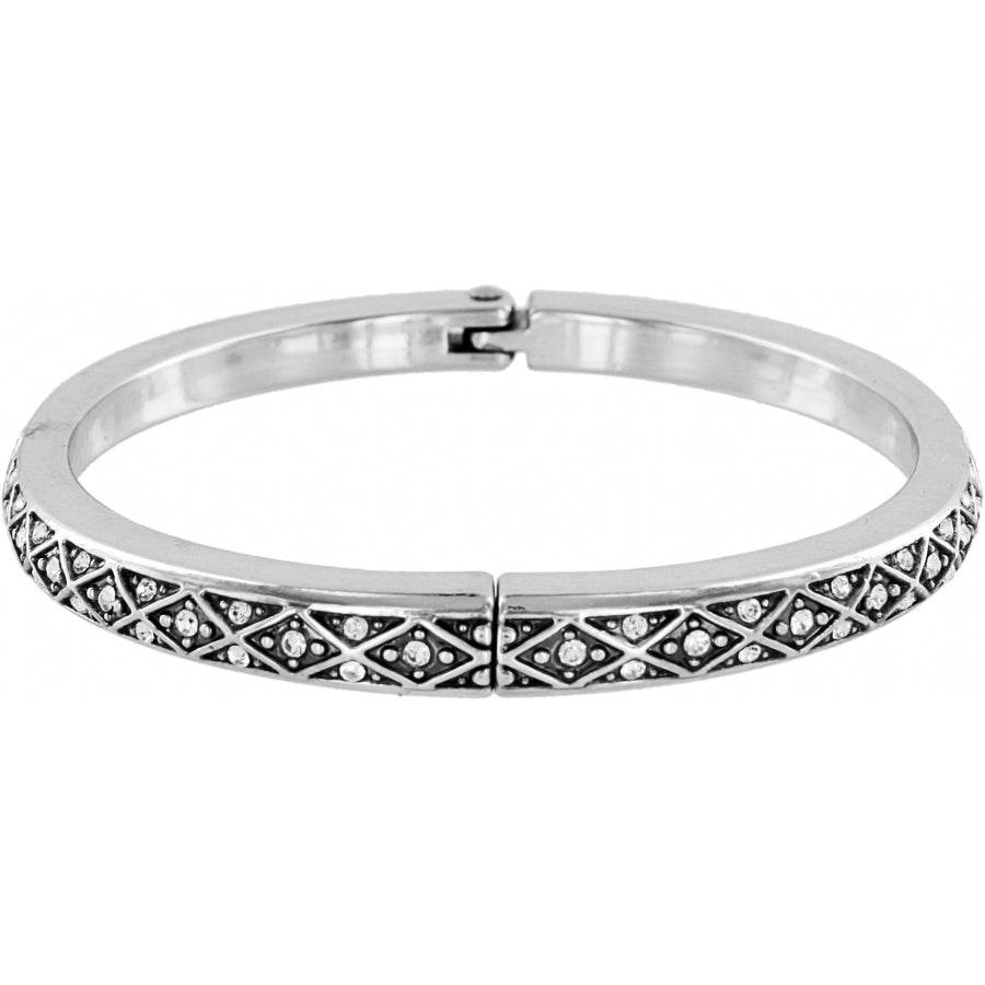 Silver plated hinged bangle with a diamond pattern and fine-quality crystal accents.