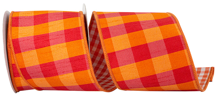 4 inch orange and red Dupioni Tierra check gingham wired edge ribbon on a spool.