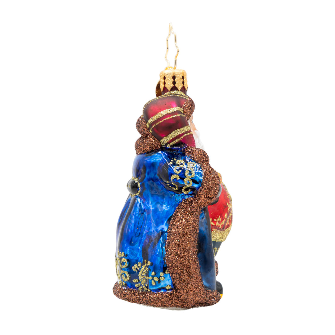 Side view of Keymaster Klaus Gem Santa ornament in navy blue and champagne glitter.