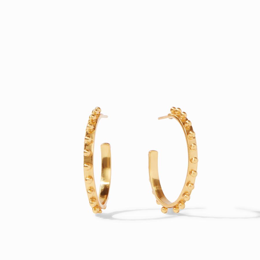Gold studded hoop earring with mixed metal beads on a gold plate.