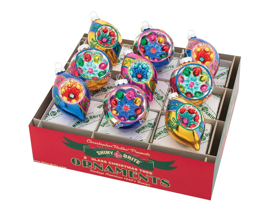 Vintage-inspired Christopher Radko Christmas confetti round ornament with red and gold decor.