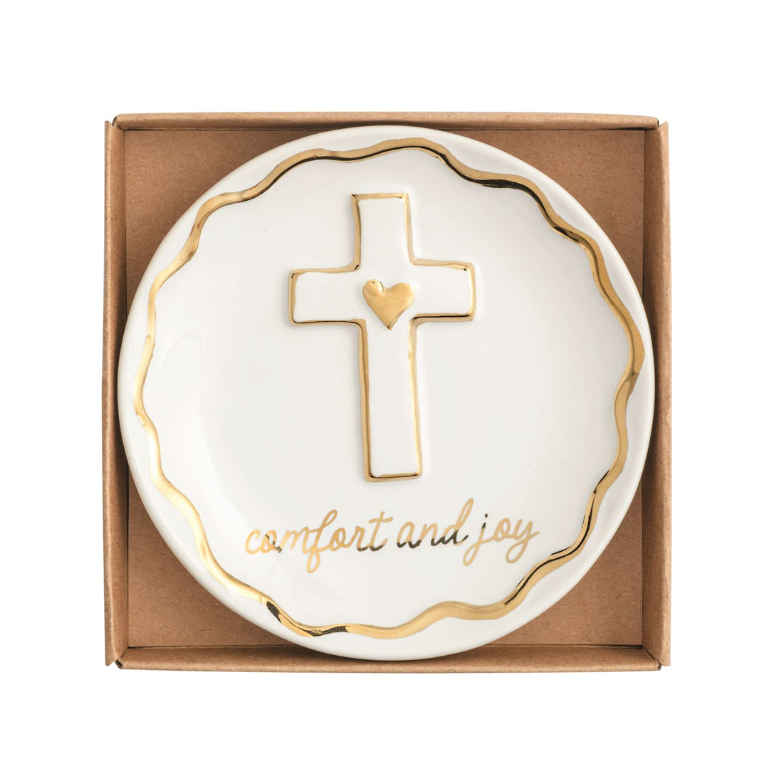 White stoneware trinket dish with a gold-rimmed cross, heart, and "comfort and joy" script.