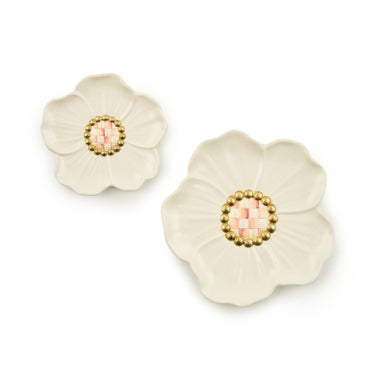 Two hand-painted rosy resin trinket dishes with floral patterns.