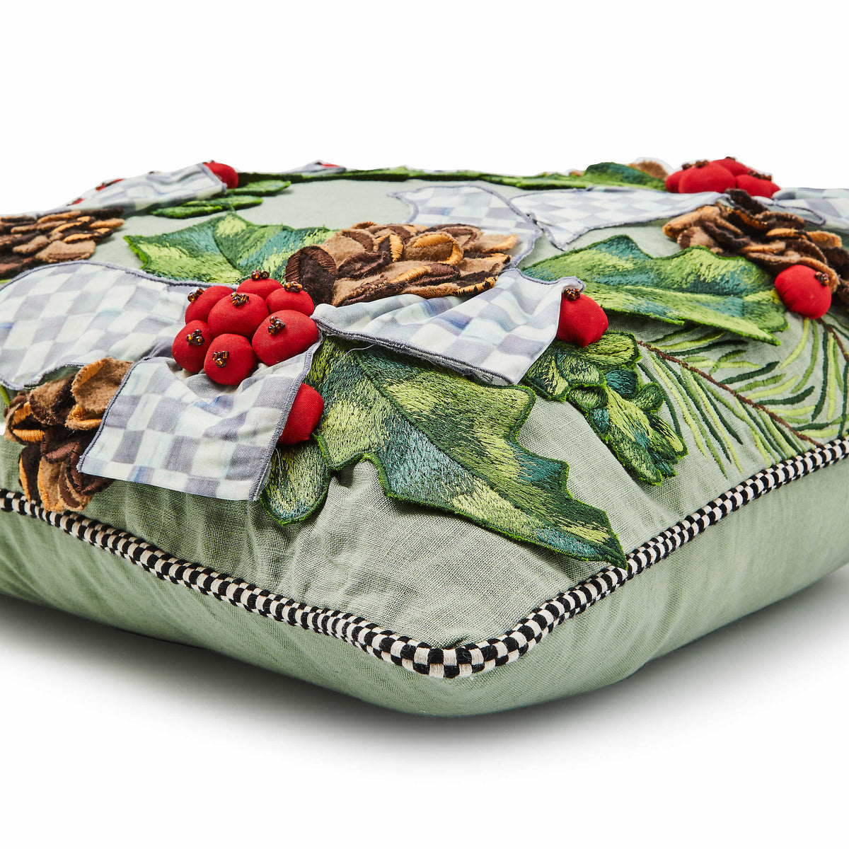 Farmhouse holly holiday throw pillow with red green leaf print on linen fabric