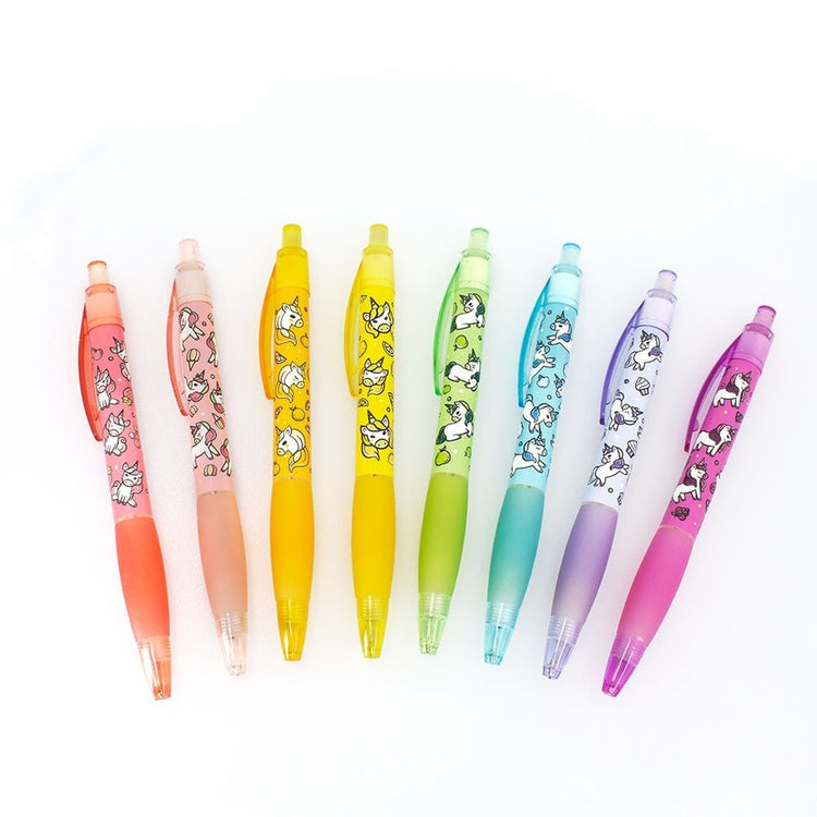 Set of eight mechanical pencils with unicorn grip patterns in pastel colors.