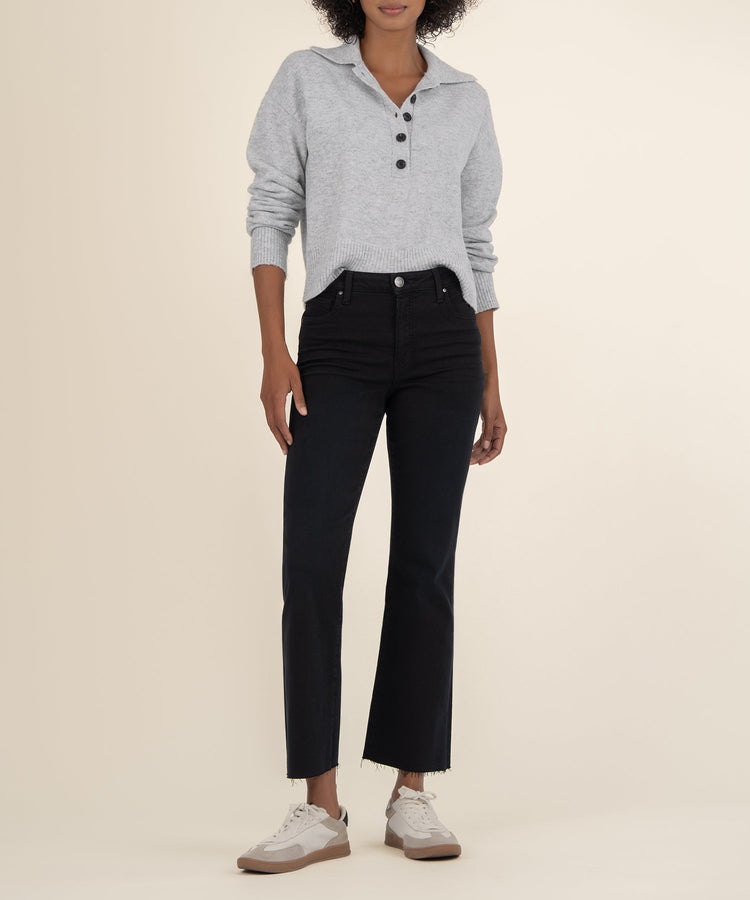 Woman wearing the light grey Lilia Button Front L/S Sweater with black flared jeans and sneakers.