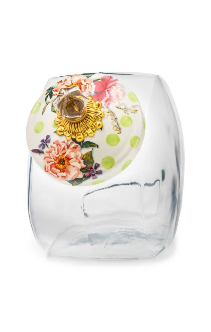 Green glass cookie jar with hand-glazed steel lid featuring wildflower floral transfers.