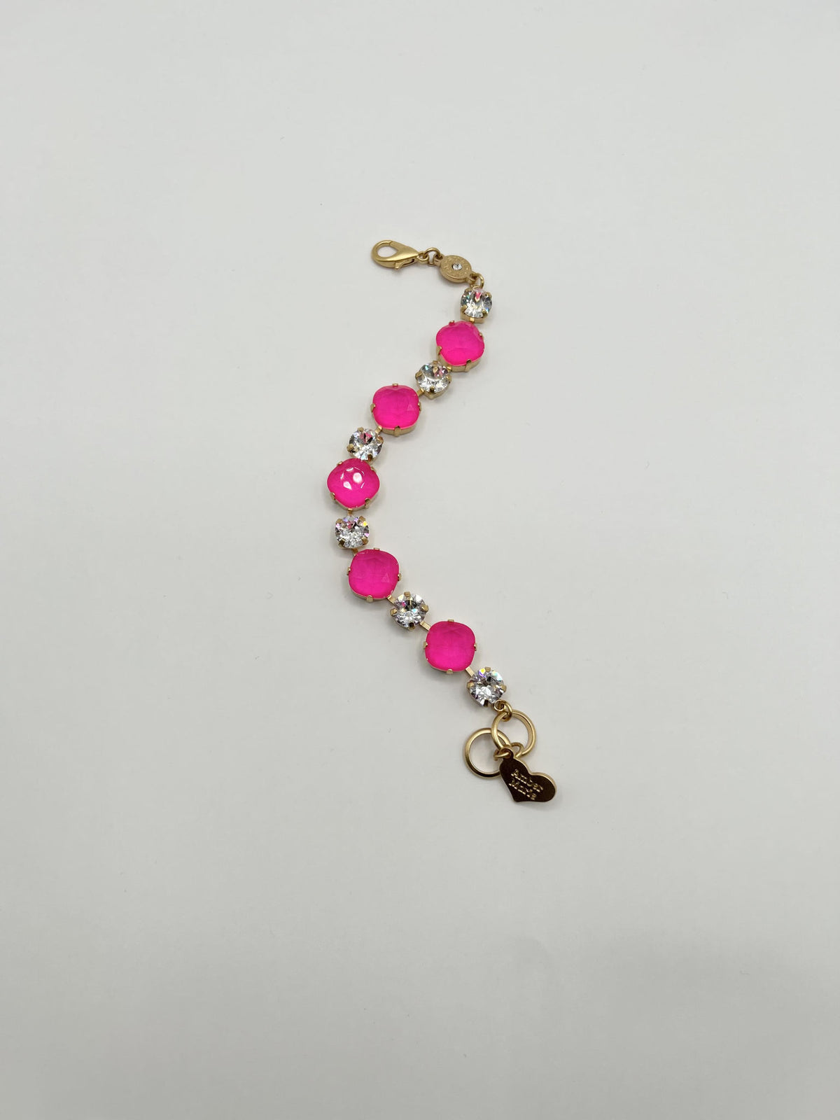 Gold Premier Bracelet by Stilwater featuring a sleek gold-tone chain with an oval pendant.
