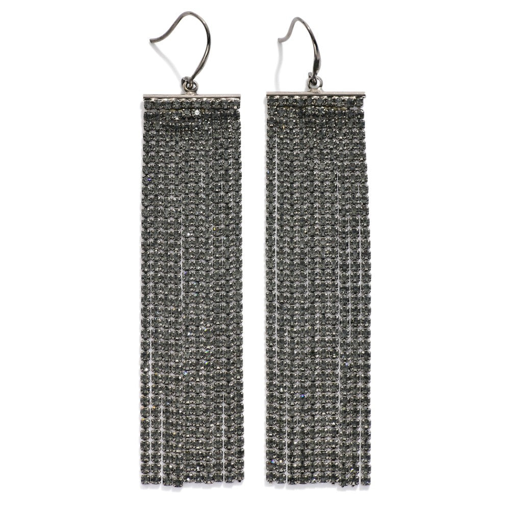 Silver drop earrings with cascading clear rhinestones on a fringe silhouette.