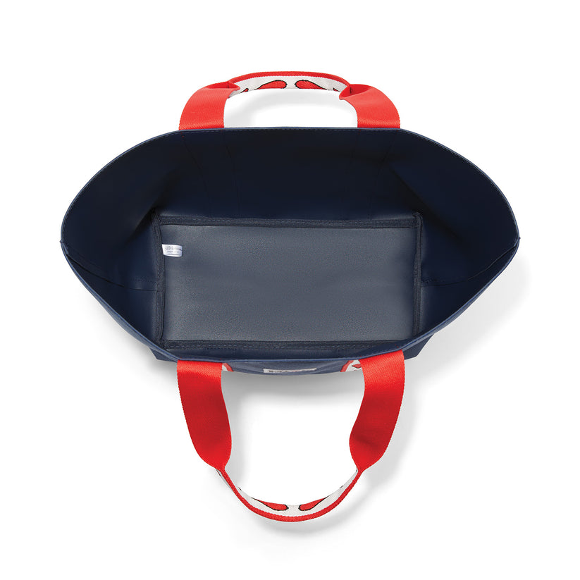 Interior view of the blue Velveteen Love Tote showing the spacious PVC lining and red handles.