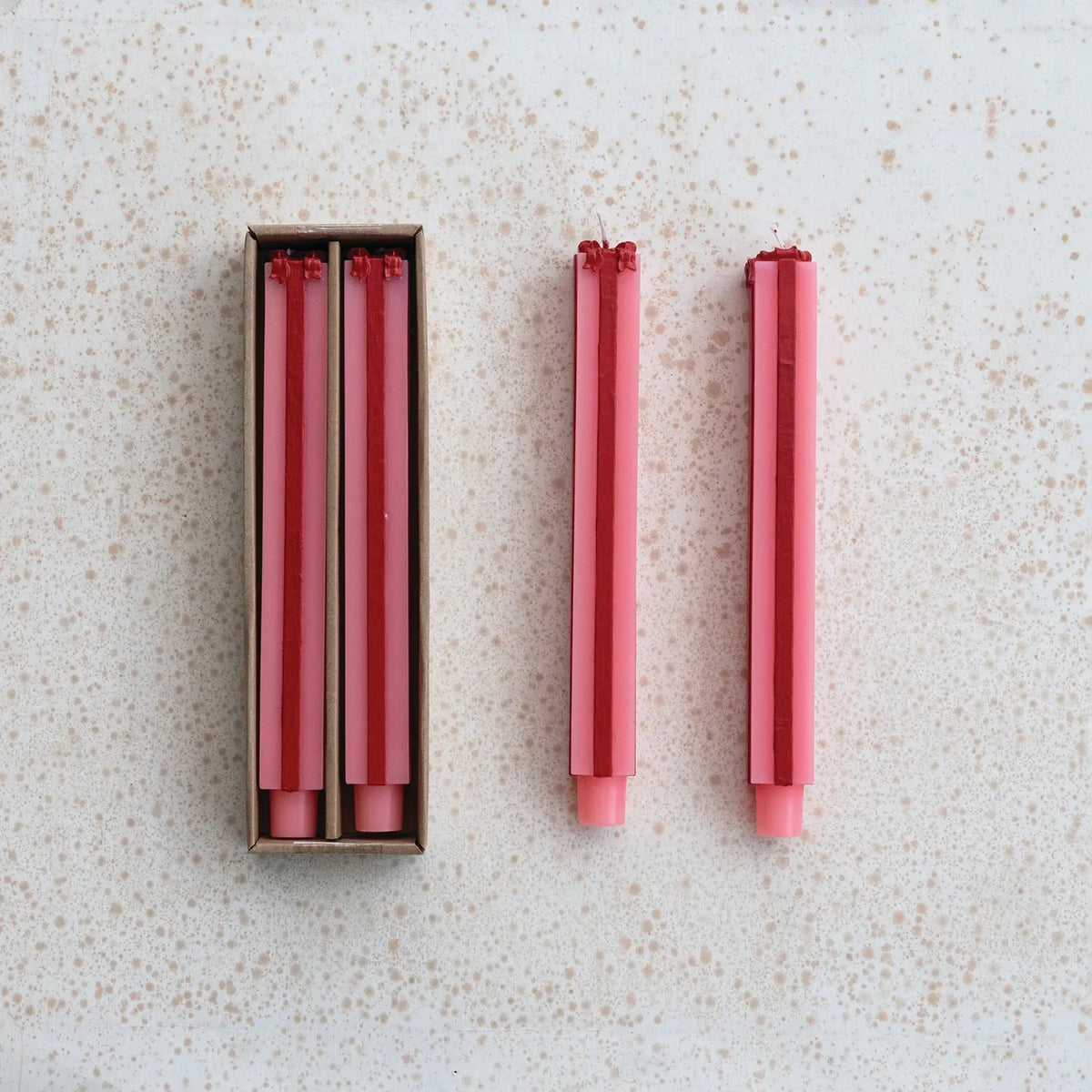 Pink unscented package-shaped taper candle with gift-box detailing
