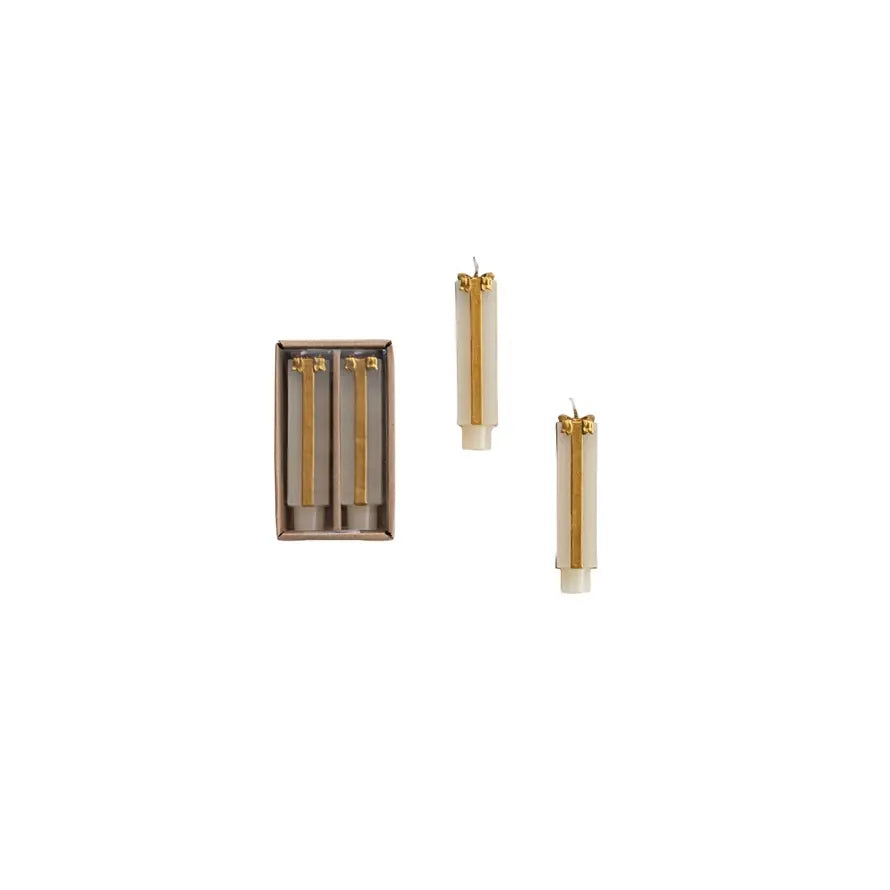 Gold unscented package-shaped taper candle with festive gift-box detailing.