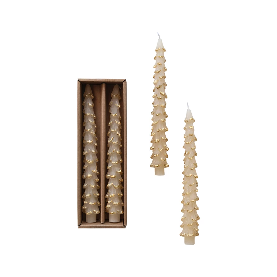 Box containing unscented tree-shaped taper candles in eggnog color with gold tips.