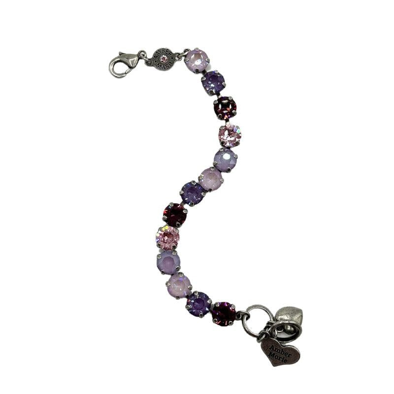 Classic Paris bracelet featuring lavender, lilac, white, and light green stones with an amber tag heart charm.
