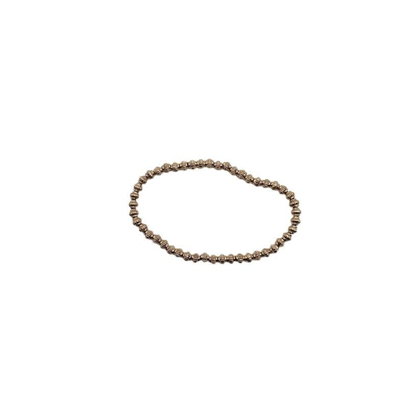 Gold decorative bead bracelet with water-resistant finish