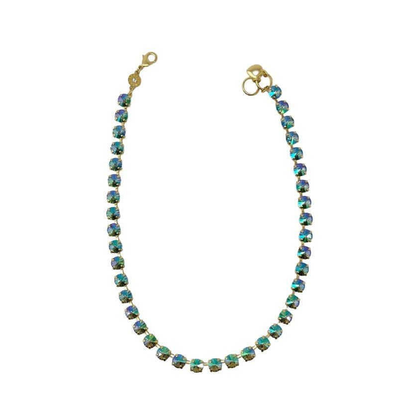 Gold classic necklace featuring a New Orleans-inspired pendant with intricate filigree detailing.