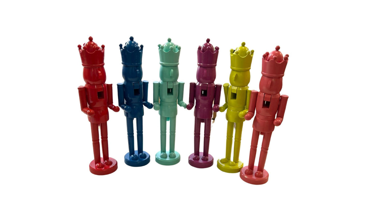 Wooden nutcracker with traditional holiday colors