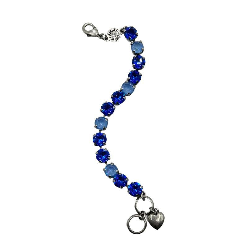 Classic Santorini bracelet with blue ombre stones, amber tag, crystal accent, and Scotty dog heart charm.