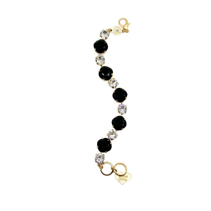 Gold Premier Bracelet featuring a sleek New York skyline silhouette in polished gold metal.