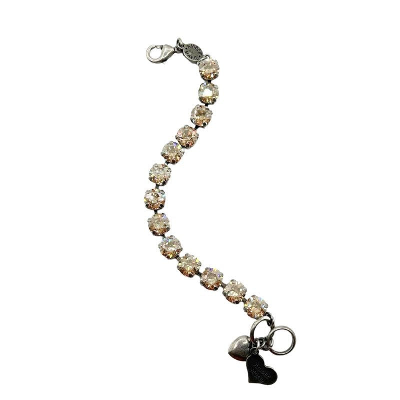 Classic Bracelet in Istanbul featuring dark blue, brown, and gold tones with a textured pattern.