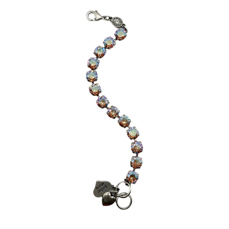 Classic Bracelet in Istanbul featuring dark blue, brown, and gold tones with a mixed material design.