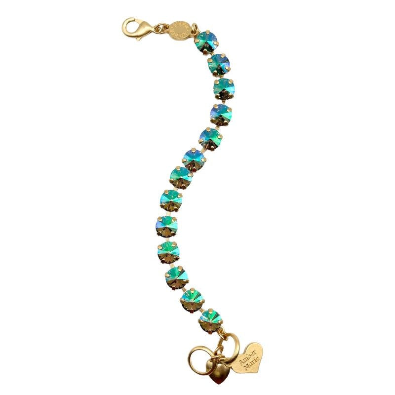 Green, yellow, and purple stone bracelet with amber tag and Scotty dog heart charm