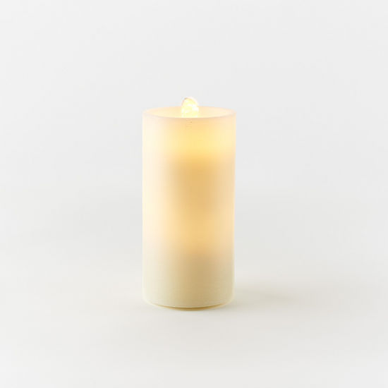 Large cream-colored water wick candle with remote control in a cylindrical glass jar.