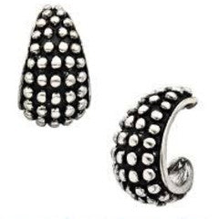 Silver chunky hoop earrings with studs on a white background.