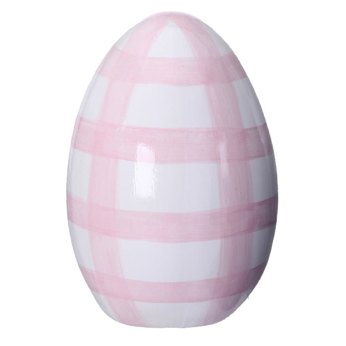Terracotta check-patterned egg with smooth painted finish