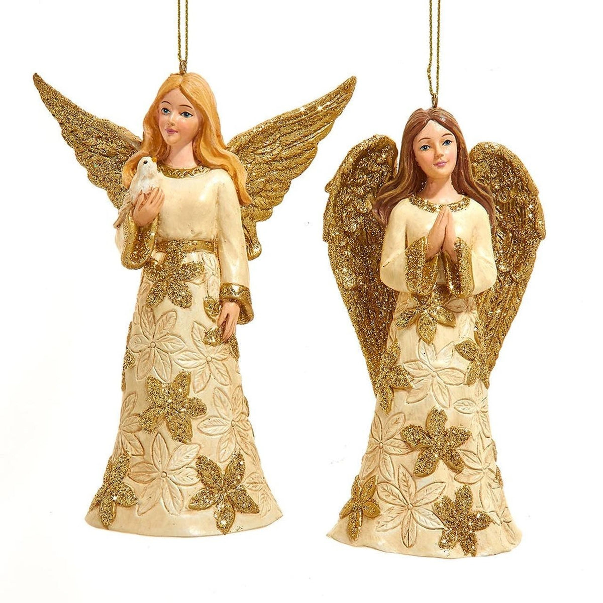 Two ivory and gold resin angel ornaments with glittery wings, one holding a dove and one praying.