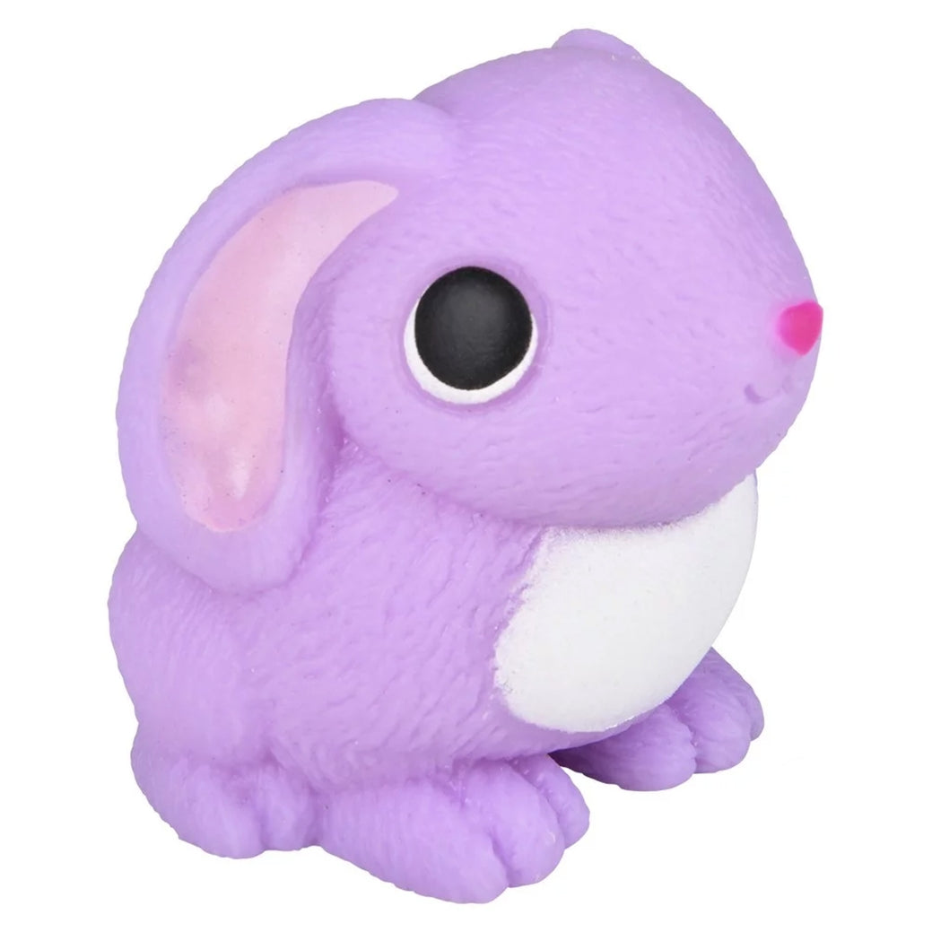 Squishy Easter bunny toy in pastel pink with stretchable texture