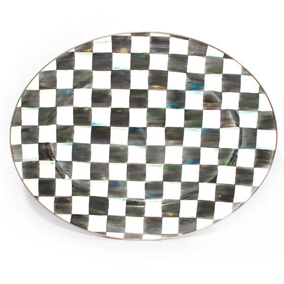 Large oval platter with hand-painted black and white Courtly Check pattern and bronzed steel rim.