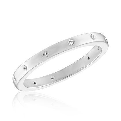 Silver mini starburst stack ring with small inset crystals on a white background.