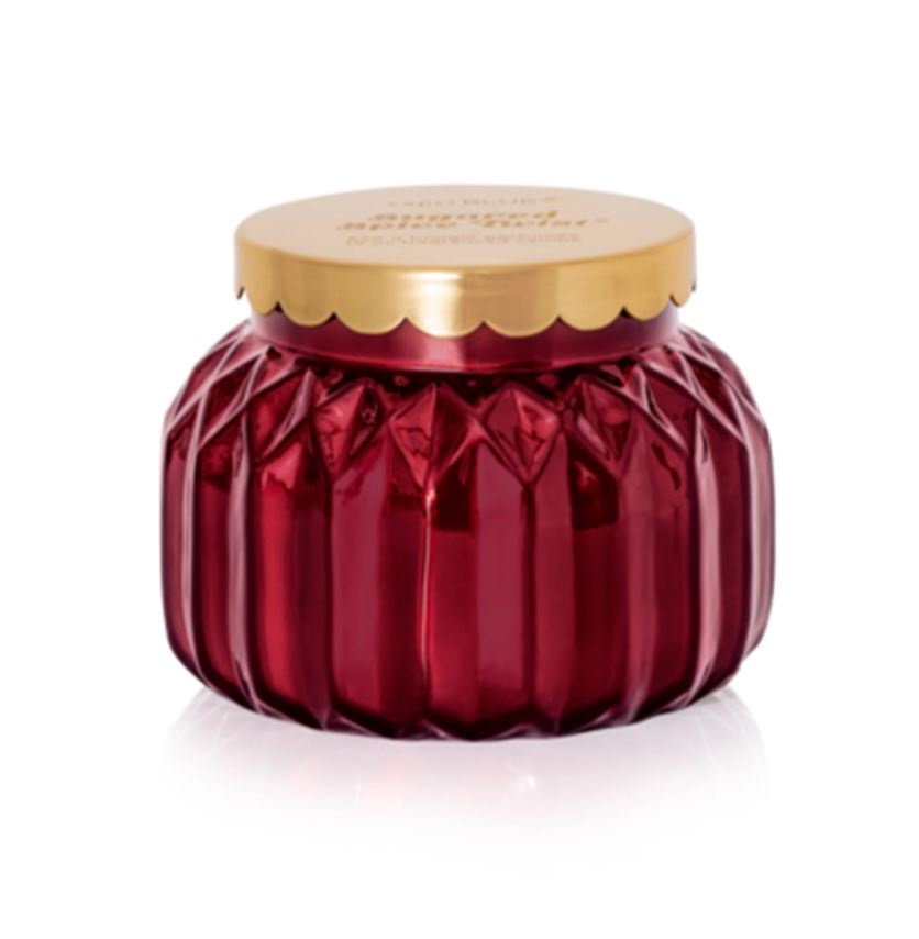 Royal Gem Sugared Spice Twist Signature Candle in a faceted red glass jar with a gold scalloped lid.
