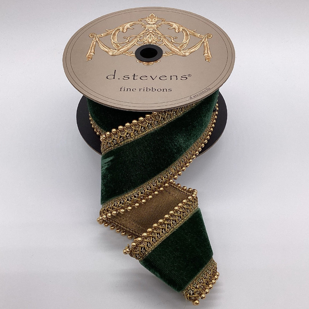 2.5 inch wide dark green velvet ribbon with antique gold beaded trim on a spool.