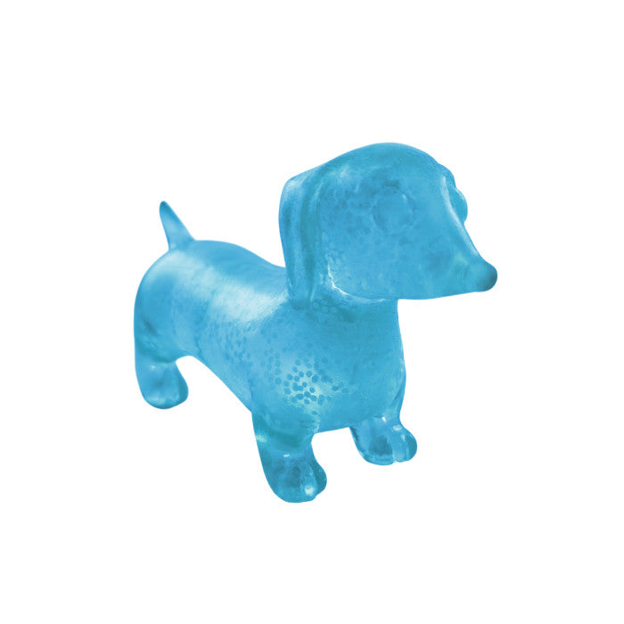 Gummy Glow Dog toy with glowing green translucent gummy bear shape