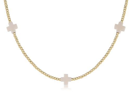 A 15-inch choker necklace featuring a signature cross pendant made with 2mm gold-filled beads.