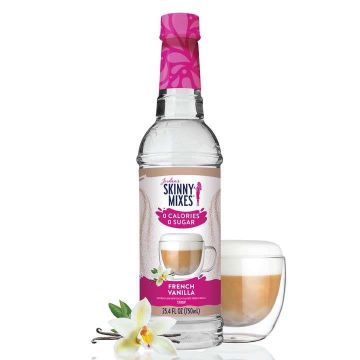 750ml bottle of Jordan's Skinny Mixes Sugar Free French Vanilla Syrup next to a latte and flower.