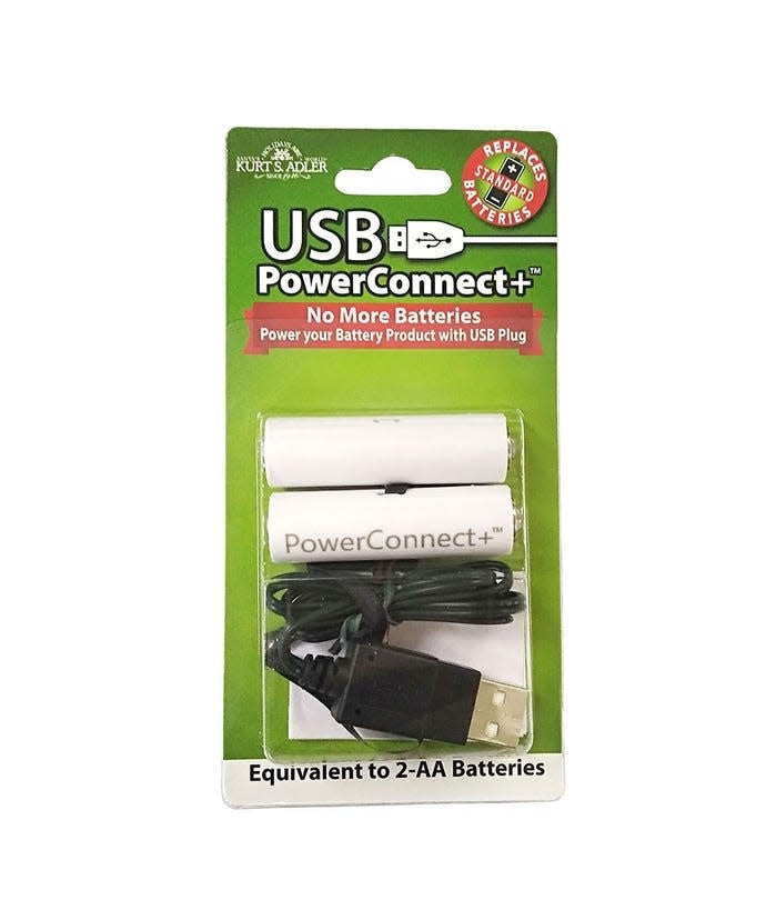 USB PowerConnect+ converter for 2-AA batteries in white packaging with a USB cable.