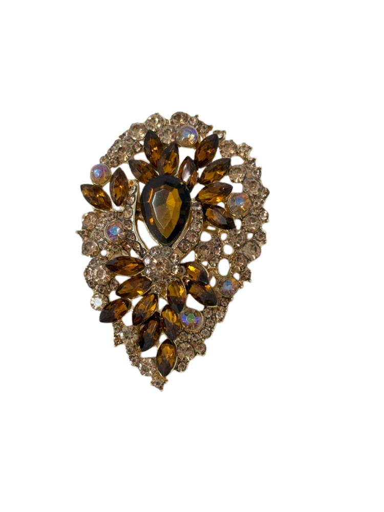 Crystal acorn statement brooch with amber and iridescent stones in a gold-tone setting.