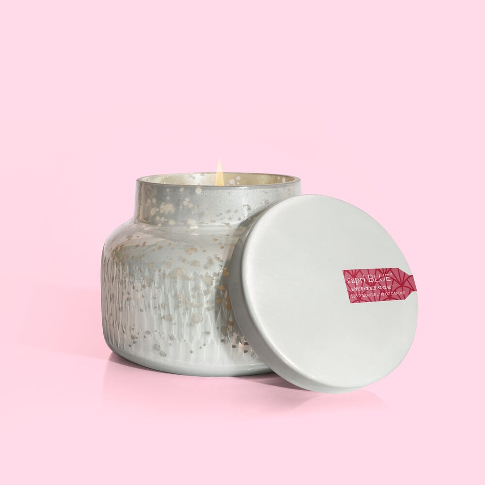 Mercury Holiday Signature jar candle with a silver metallic finish.