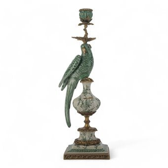 Green porcelain parrot candle holder with bronze ormolu accents on a decorative pedestal base.