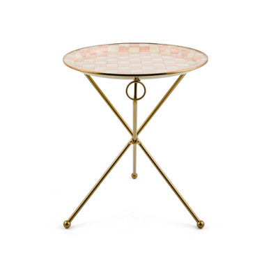 Round Rosy Check enamel accent table with bronzed stainless steel rim on a brass-finished metal frame.