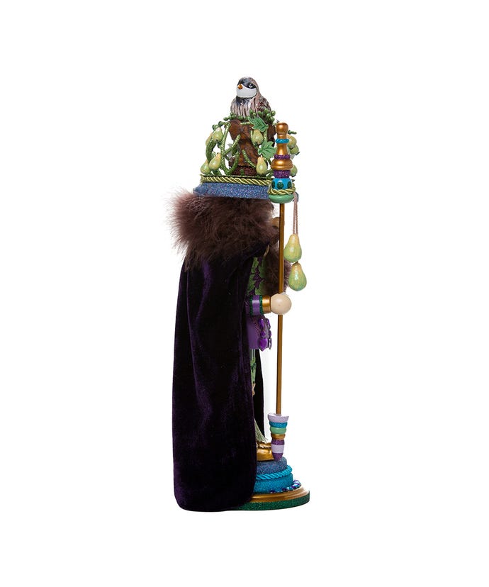 18-inch nutcracker in a purple velvet cape with a partridge in a pear tree crown.