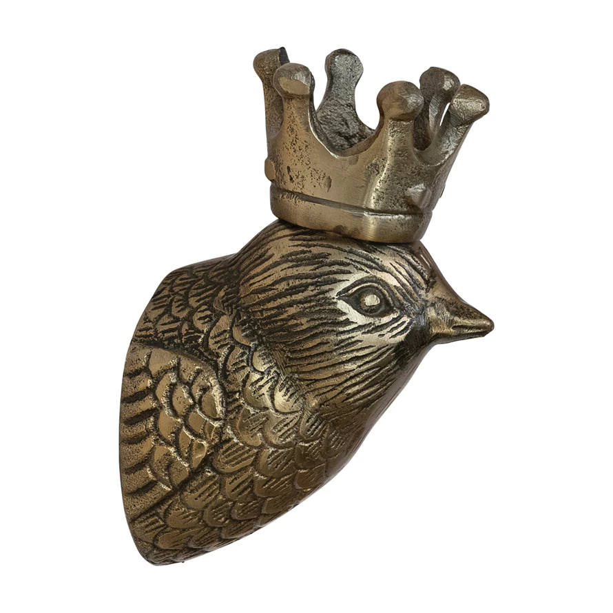 Cast aluminum bird head wall decor in antique brass finish with crown detail