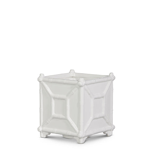White ceramic planter with bamboo-inspired texture measuring six inches tall.