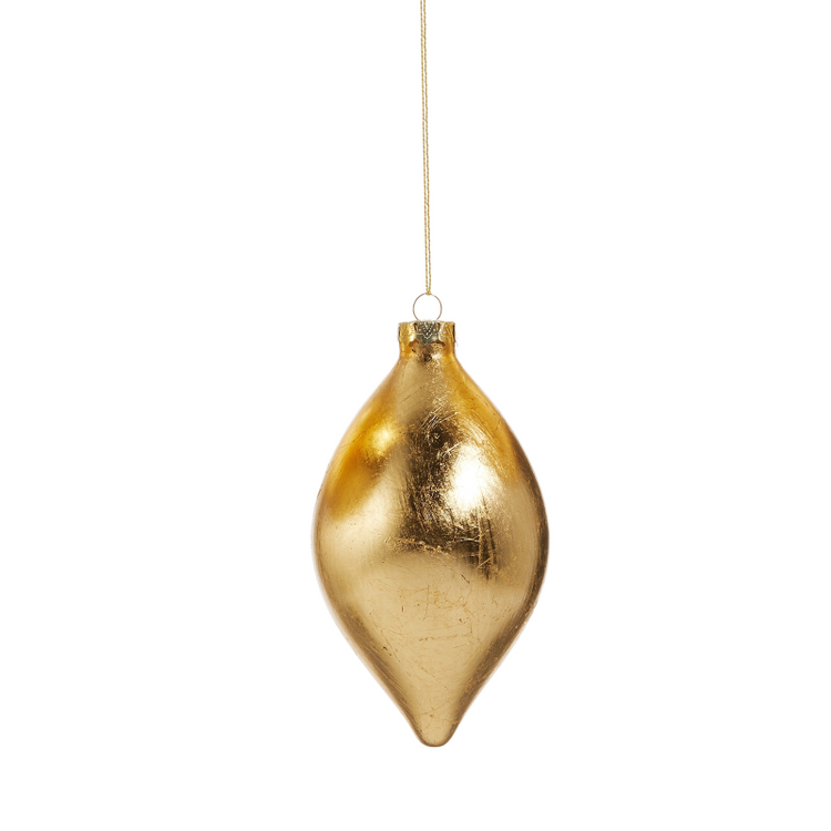 Teardrop-shaped gold leaf glass ornament with a metallic foil finish hanging from a gold string.