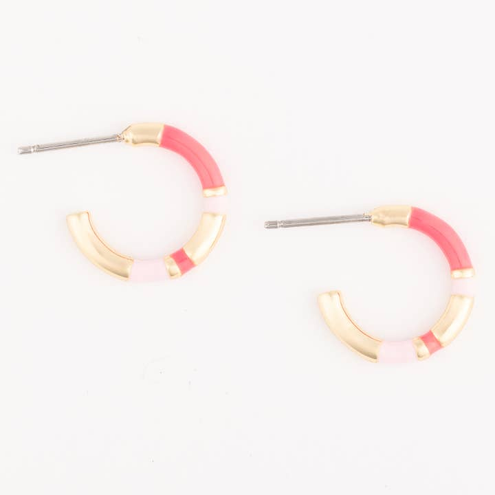 Pair of gold hoop earrings with alternating pink, light pink, and gold enamel segments.