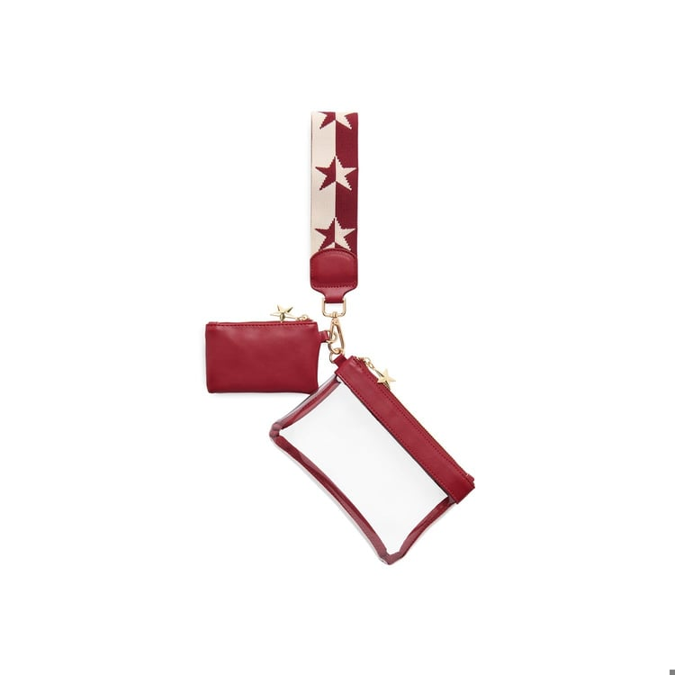 Red spectator wristlet with a clear pouch, a small red pouch, and a star-patterned strap.