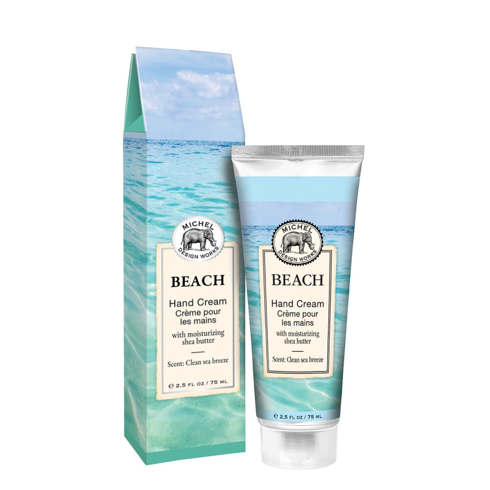 Michel Design Works Beach hand cream tube and matching box with a blue ocean and sky print.
